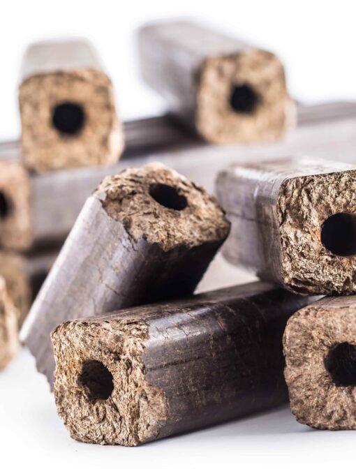 wooden-pressed-briquettes-pini-kay-from-biomass-white-isolated-background (2)-min